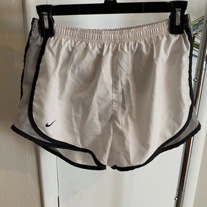 White Nike running shorts